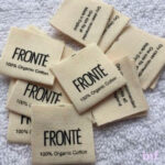 Etiquetas suaves de algodón para coser dobladas